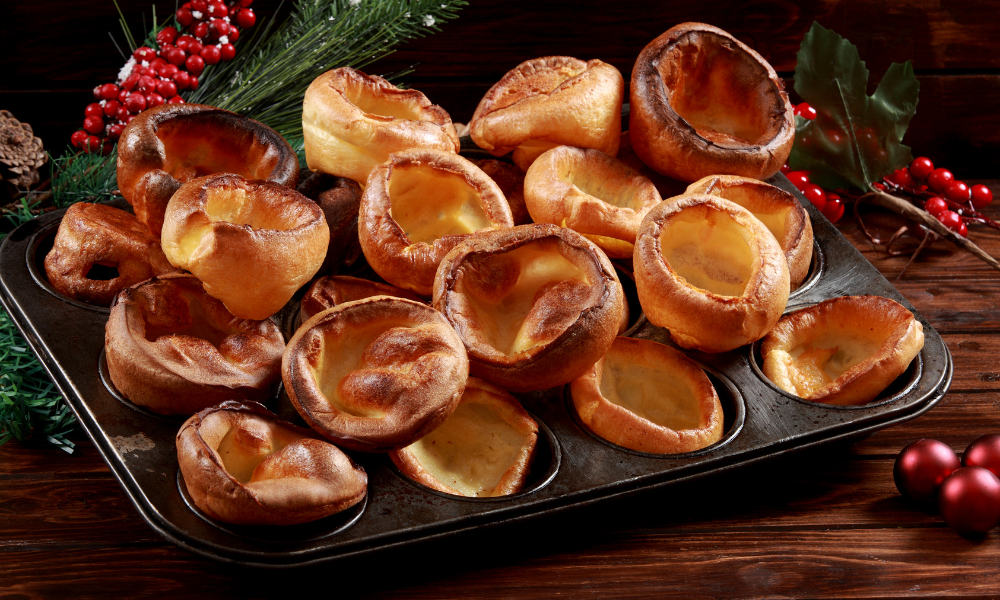 Yorkshire puddings in a tray on a christmas table