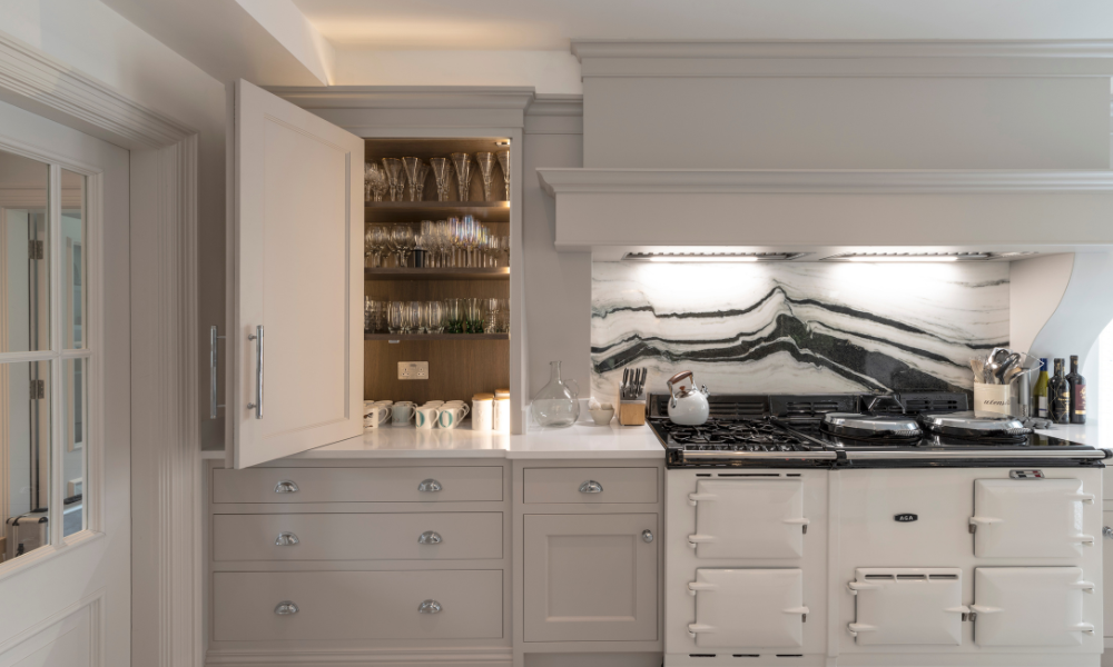 picture of a white kitchen with a white aga cooker